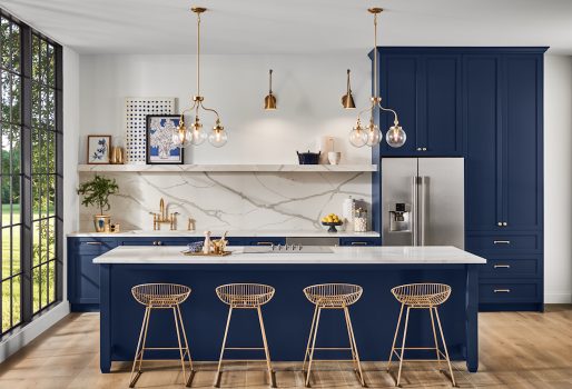 Navy kitchen with white marble island painted by KACE Painting in Bucks County